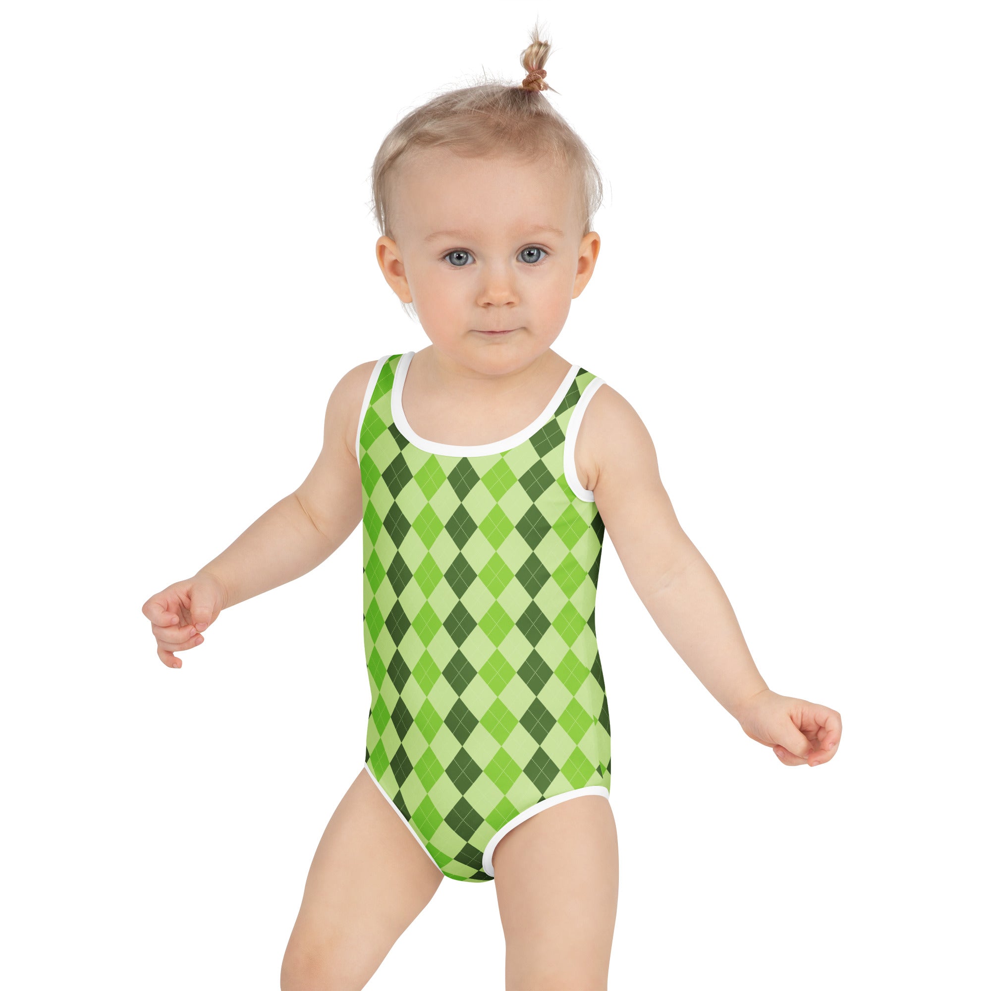 A toddler wearing a girls green argyle buttery soft swimsuit with UPF 50 plus and double layered front