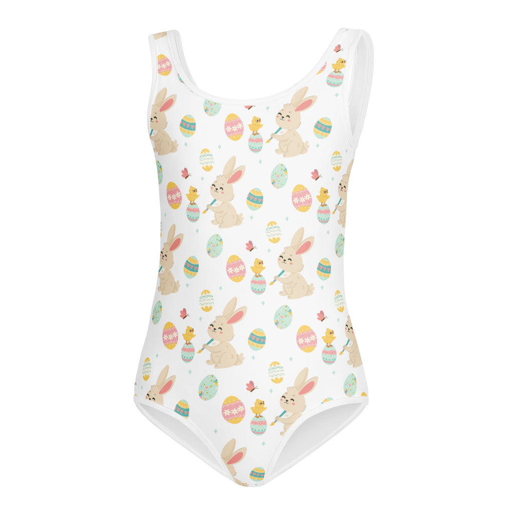 White one-piece swimsuit with playful easter pattern of beige bunnies colorful eggs and yellow chicks for girls dance
