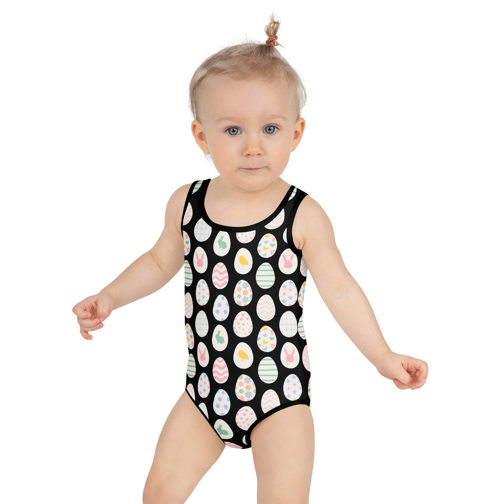 Girls easter egg pattern buttery soft black one-piece swimsuit with colorful pastel eggs and UPF 50 plus protection