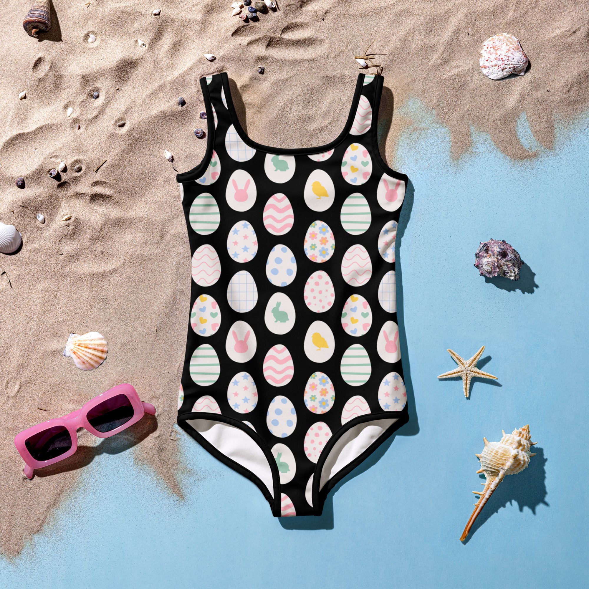 Girls Easter egg pattern buttery soft black one-piece swimsuit with pastel bunnies stripes polka dots and stars UPF 50+