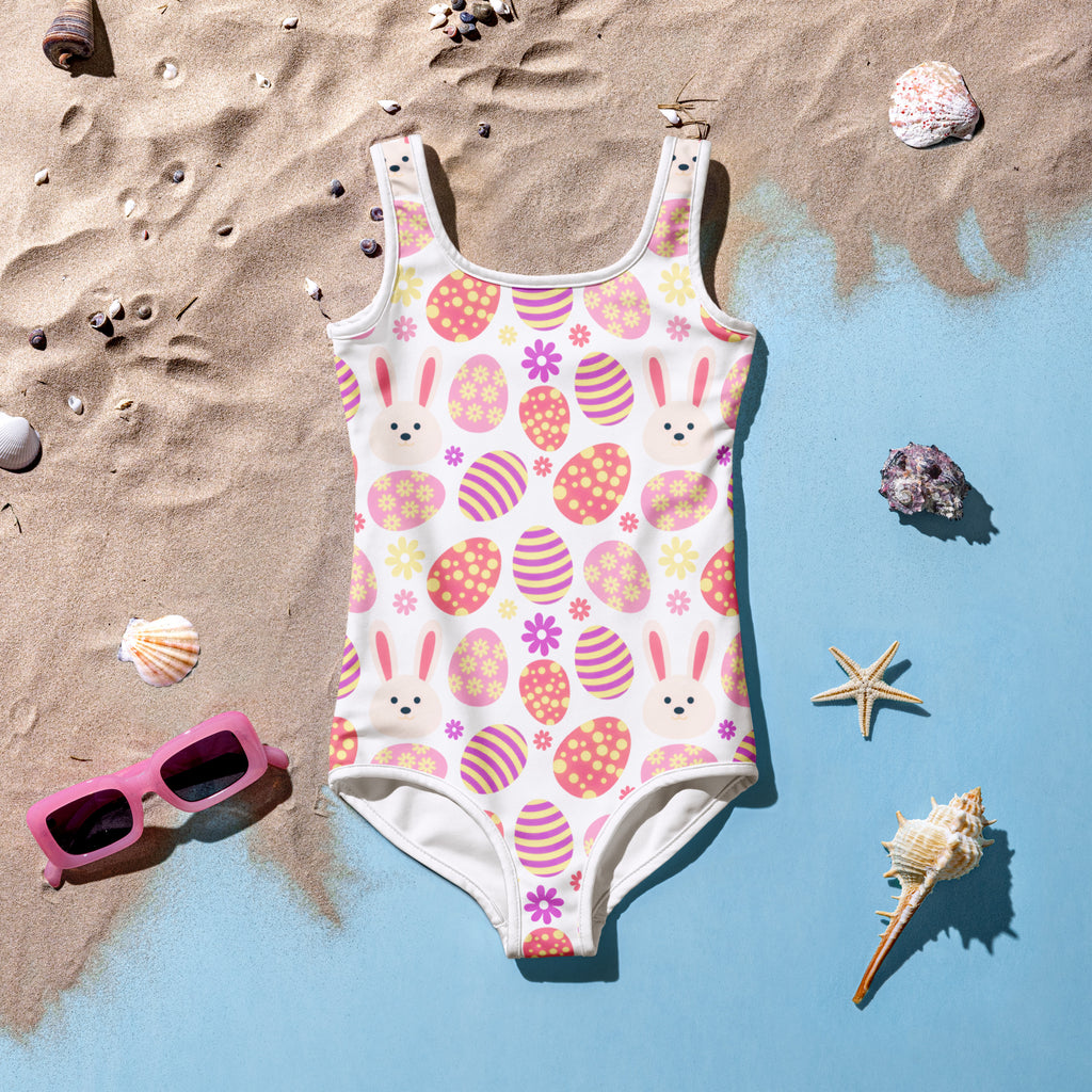 Girls pink easter bunny buttery soft white one-piece swimsuit with upf 50 double layered front and playful pattern