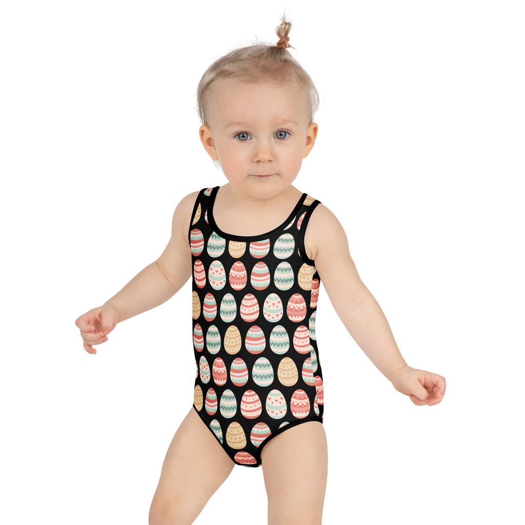 Girls Easter pattern buttery soft black one-piece swimsuit with colorful pastel eggs and UPF 50 plus protection
