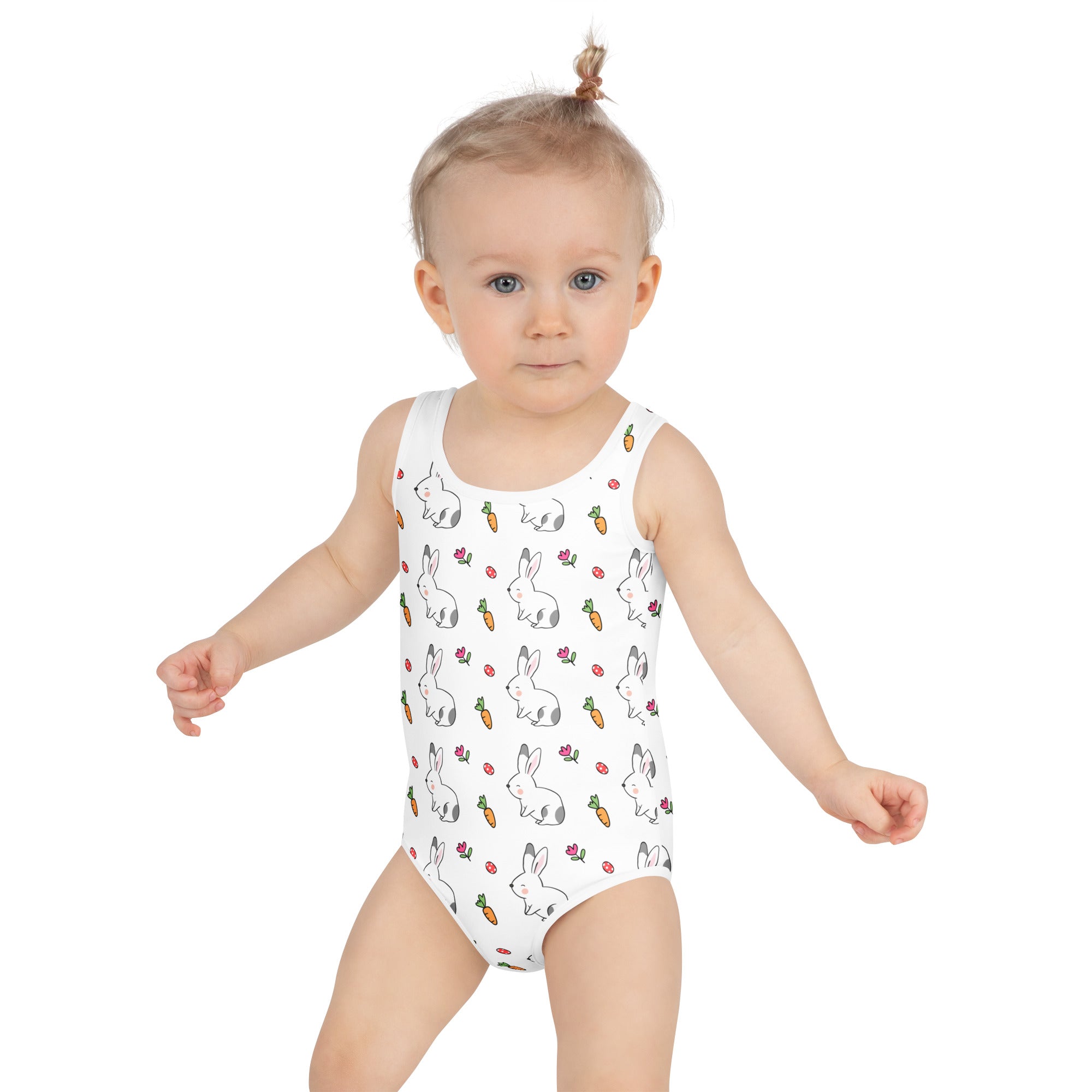 White one-piece girls bunny and carrot easter swimsuit with playful black outline pattern and upf 50 plus buttery soft fabric