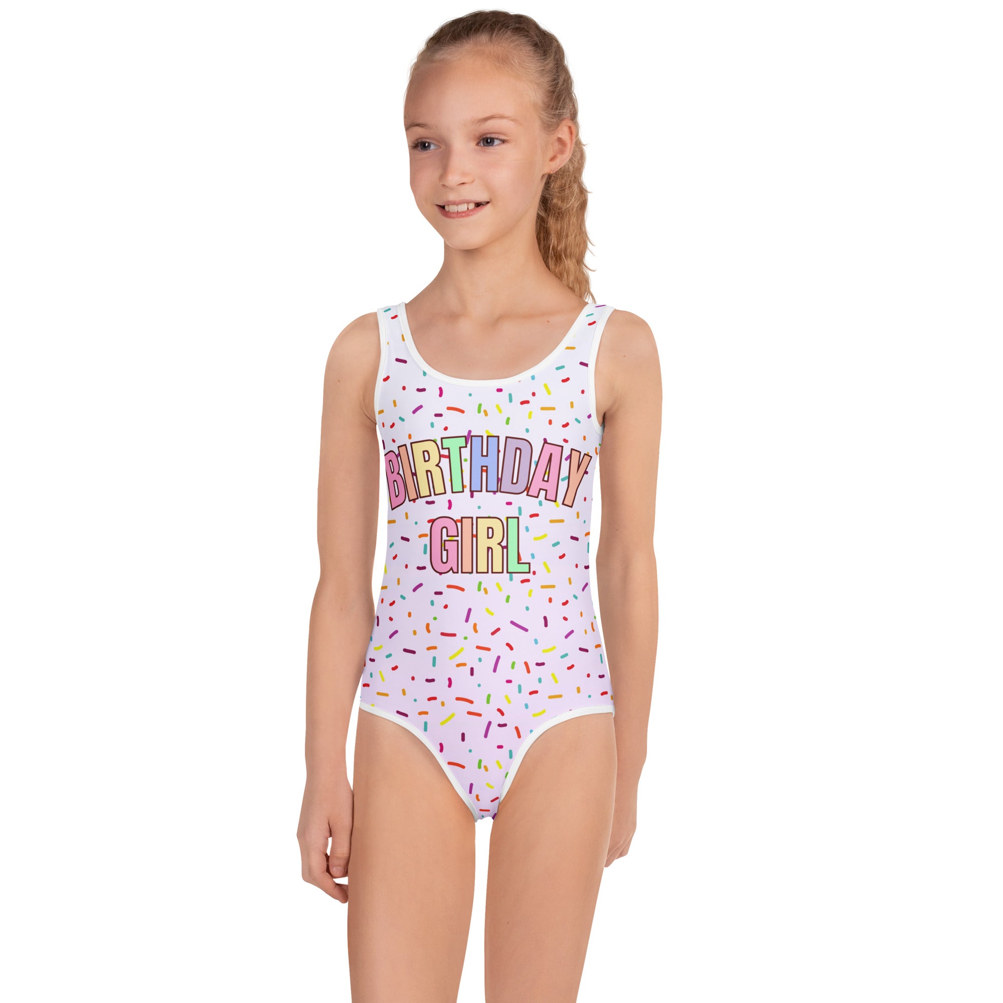 Girl wearing a swimsuit with 'Birthday Girl' text on a white background
