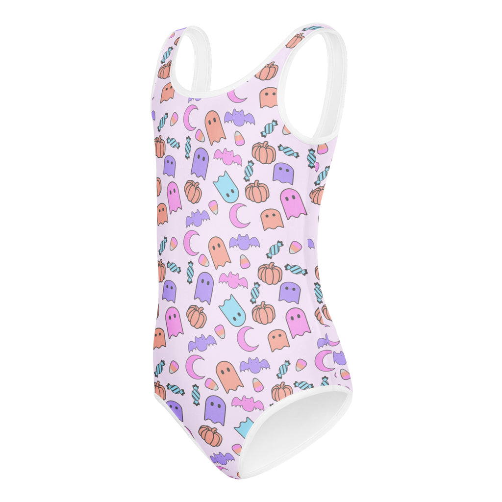 Girls halloween pattern buttery soft pastel pink leotard with white trim and playful ghost pumpkin prints for dance and gymnastics