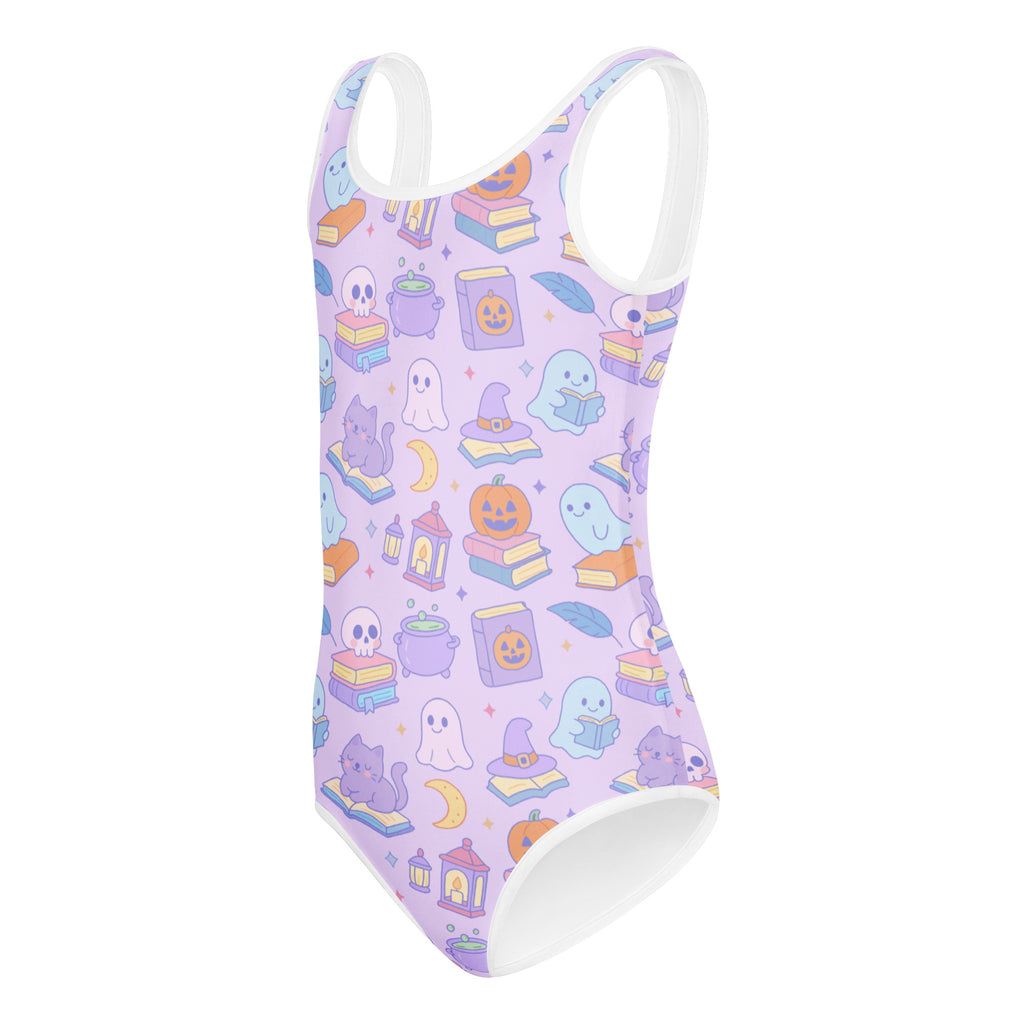 Lavender girls buttery soft halloween swimsuit with white trim and playful ghost pumpkin book cat pattern for dance