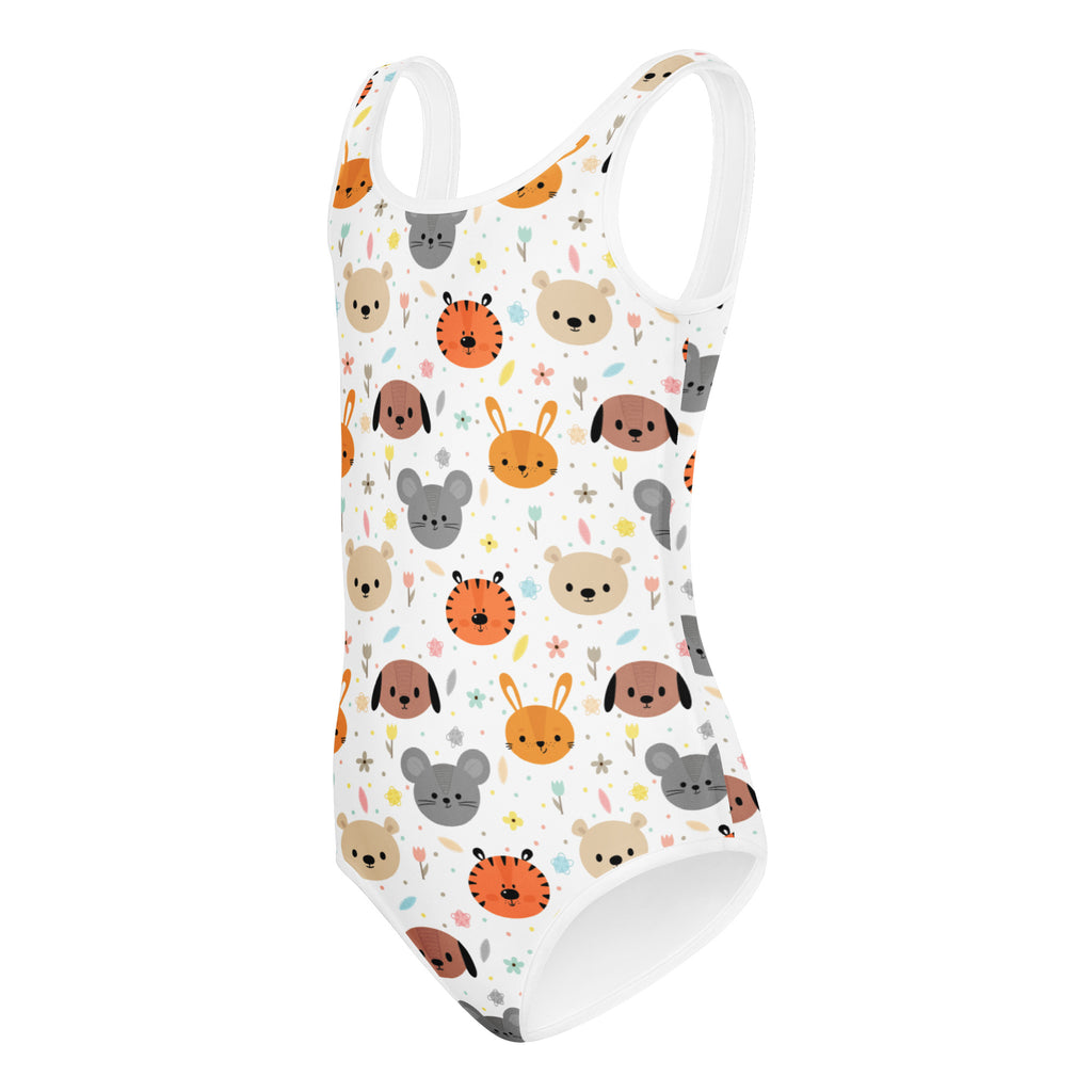 White one-piece swimsuit with playful cartoon animal faces in soft orange beige gray and brown tones for girls dance and gymnastics