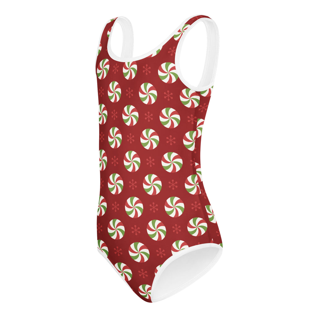 Girls peppermint candy christmas buttery soft red swimsuit with white green swirls snowflakes and white trim for dance gym