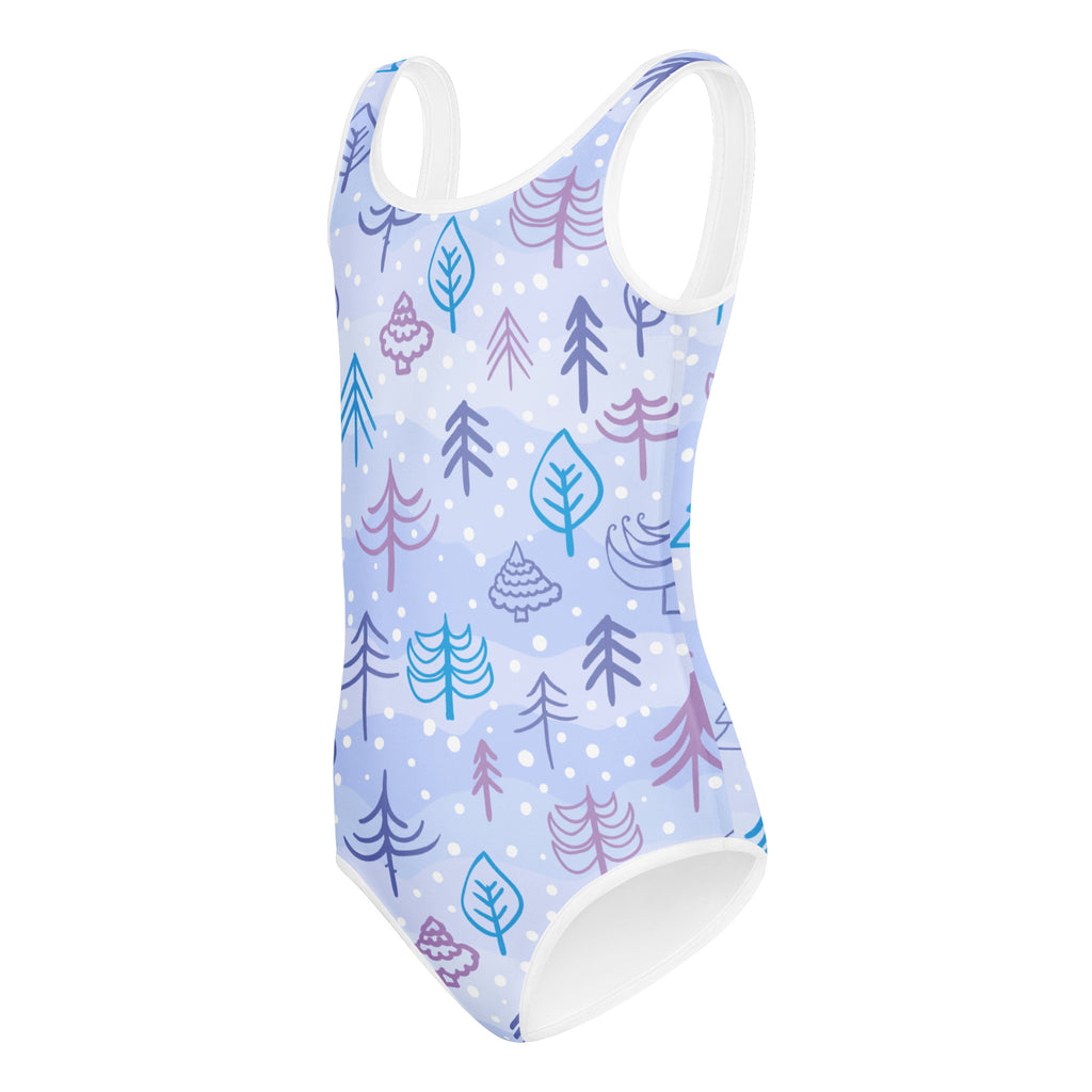 A light blue girls winter trees buttery soft leotard with white trim and purple teal tree pattern for dance and gymnastics