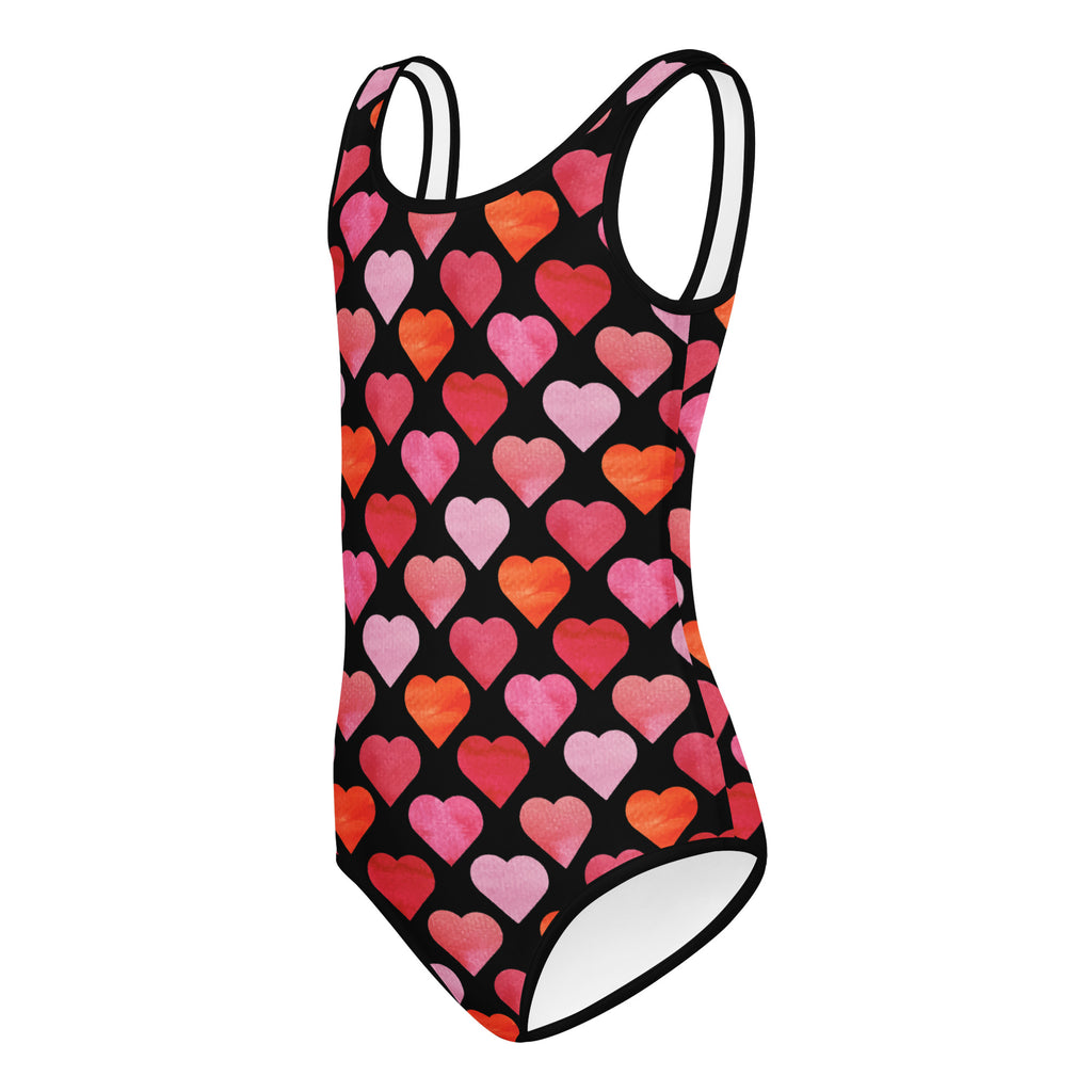 Girls Valentine’s Day black one-piece leotard with watercolor heart pattern in pink coral red buttery soft quick drying
