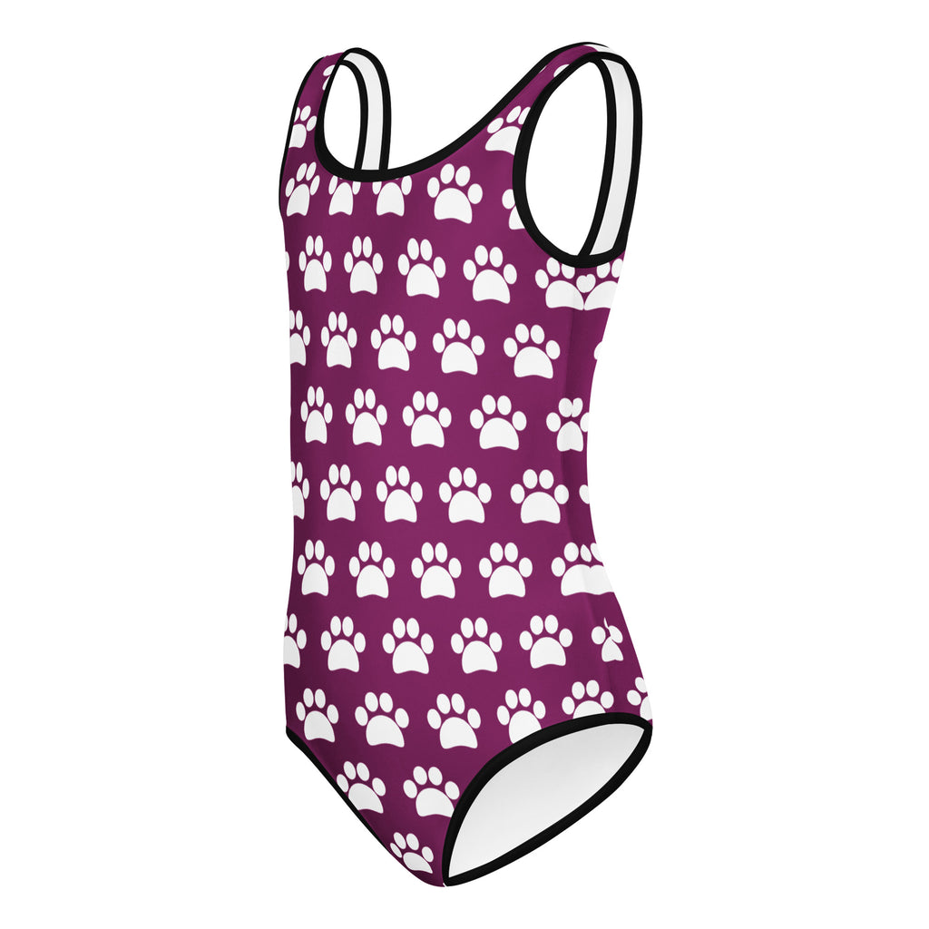 Girls purple one-piece leotard with white paw print pattern and black trim made of buttery soft quick-dry fabric