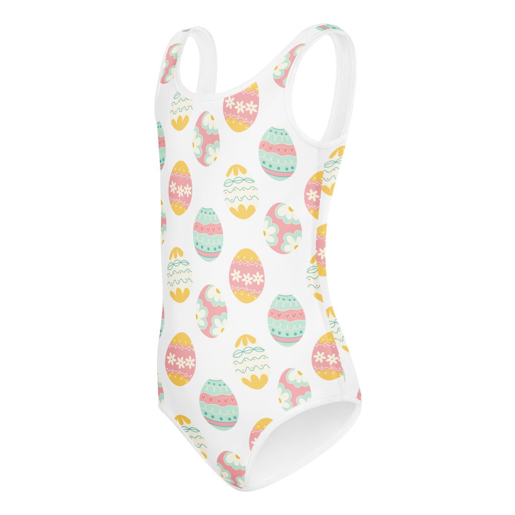 Girls pastel easter eggs buttery soft white one-piece swimsuit with pink yellow and mint green pattern for dance and gymnastics