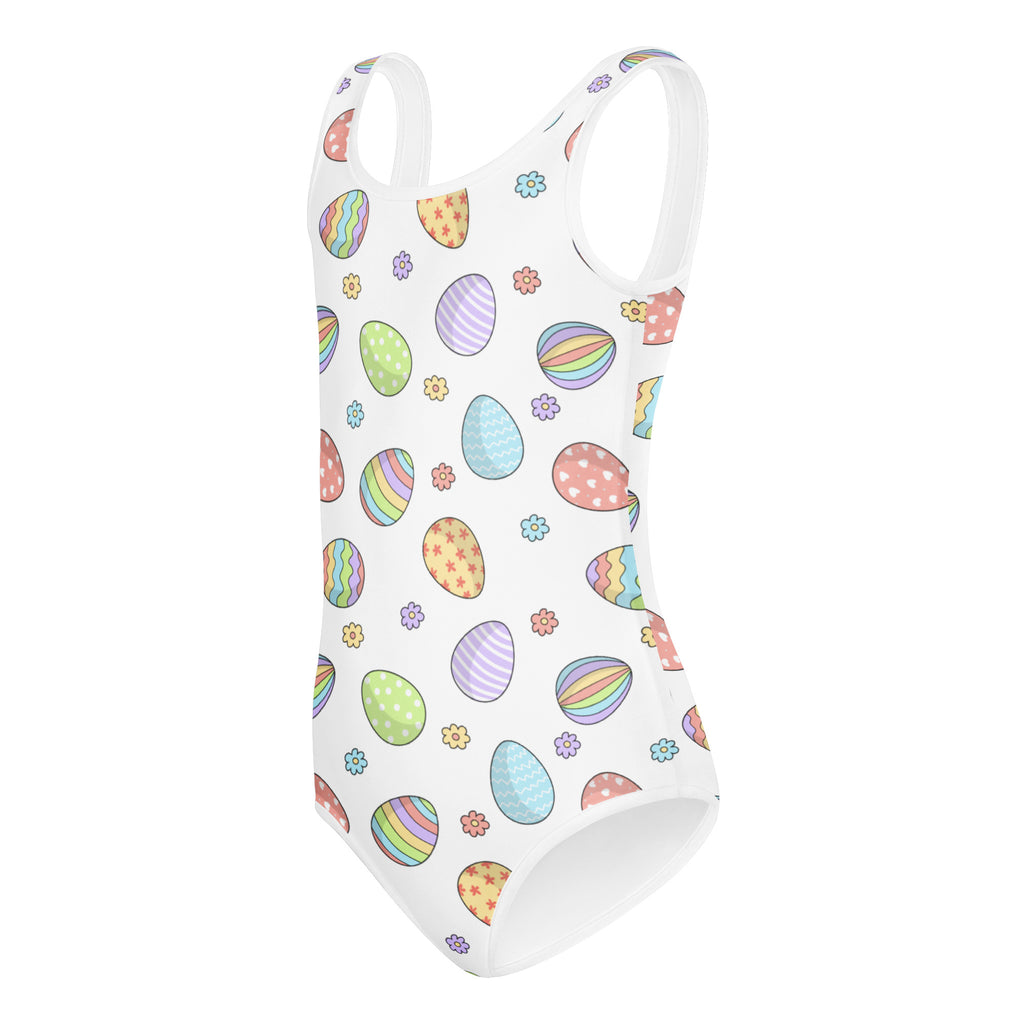 White one-piece buttery soft swimsuit with pastel rainbow easter eggs and flowers for girls dance and gymnastics