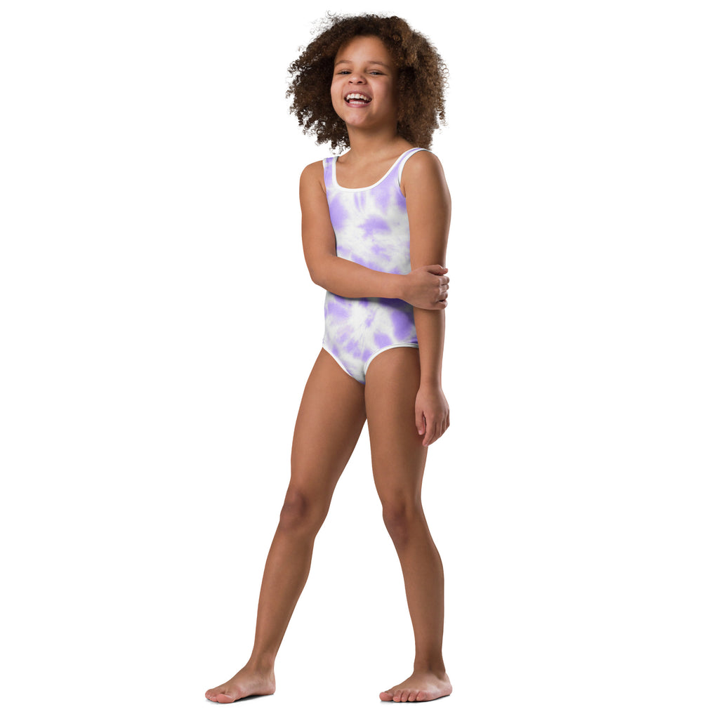 A child wearing a girls purple tie dye buttery soft leotard quick drying for dance and gymnastics
