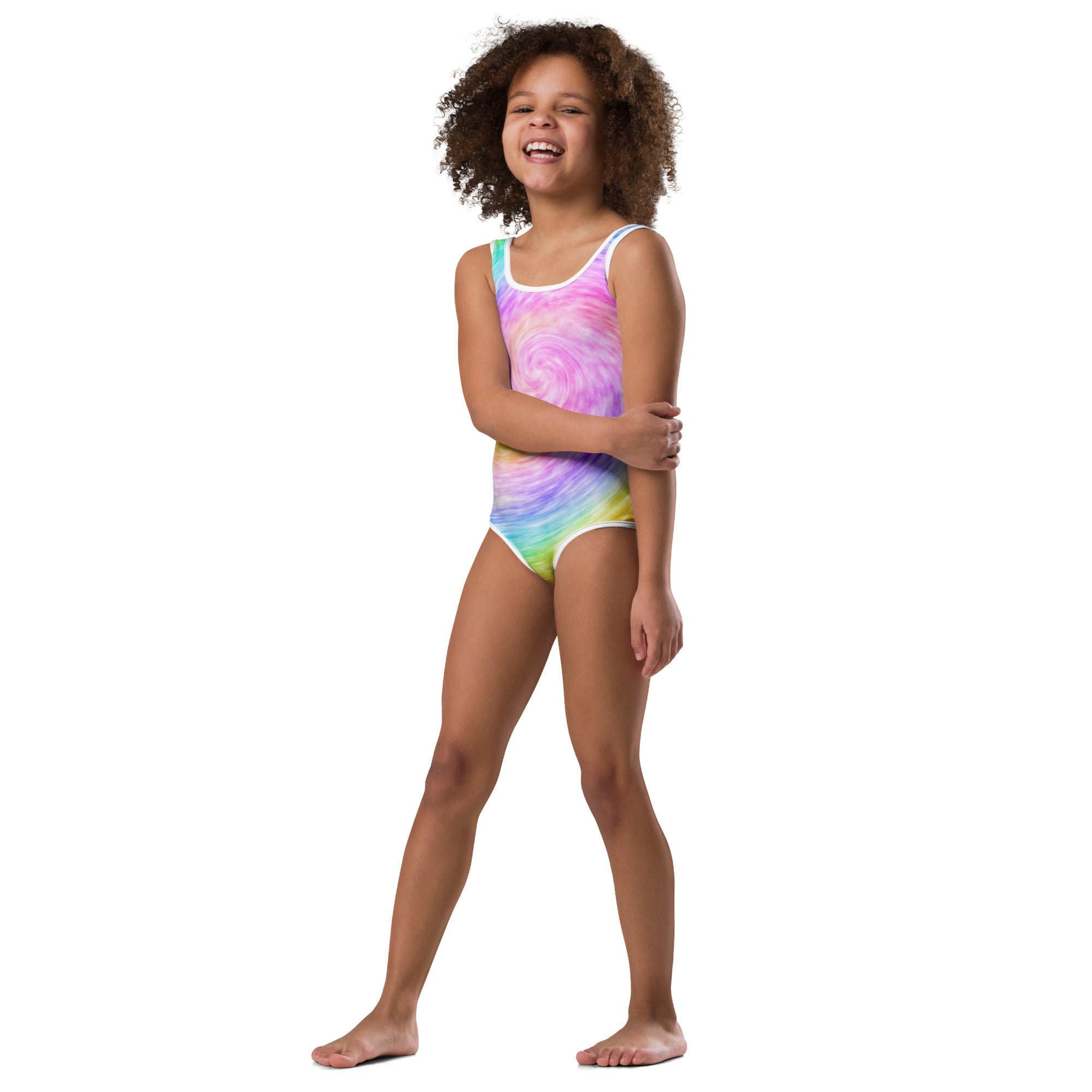 A vibrant rainbow swirl one-piece girls leotard with white trim made from buttery soft quick drying fabric for dance