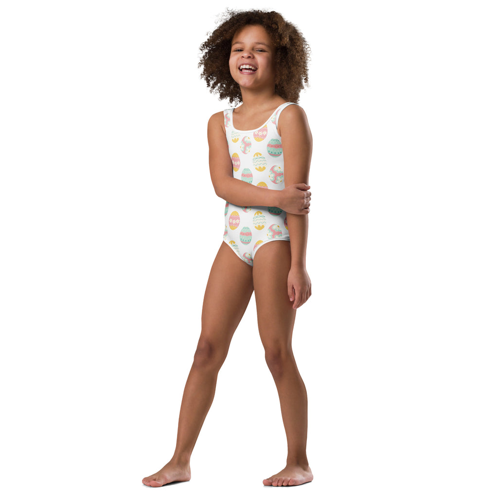 White one-piece swimsuit with colorful pastel easter egg pattern buttery soft quick drying for dance and gymnastics