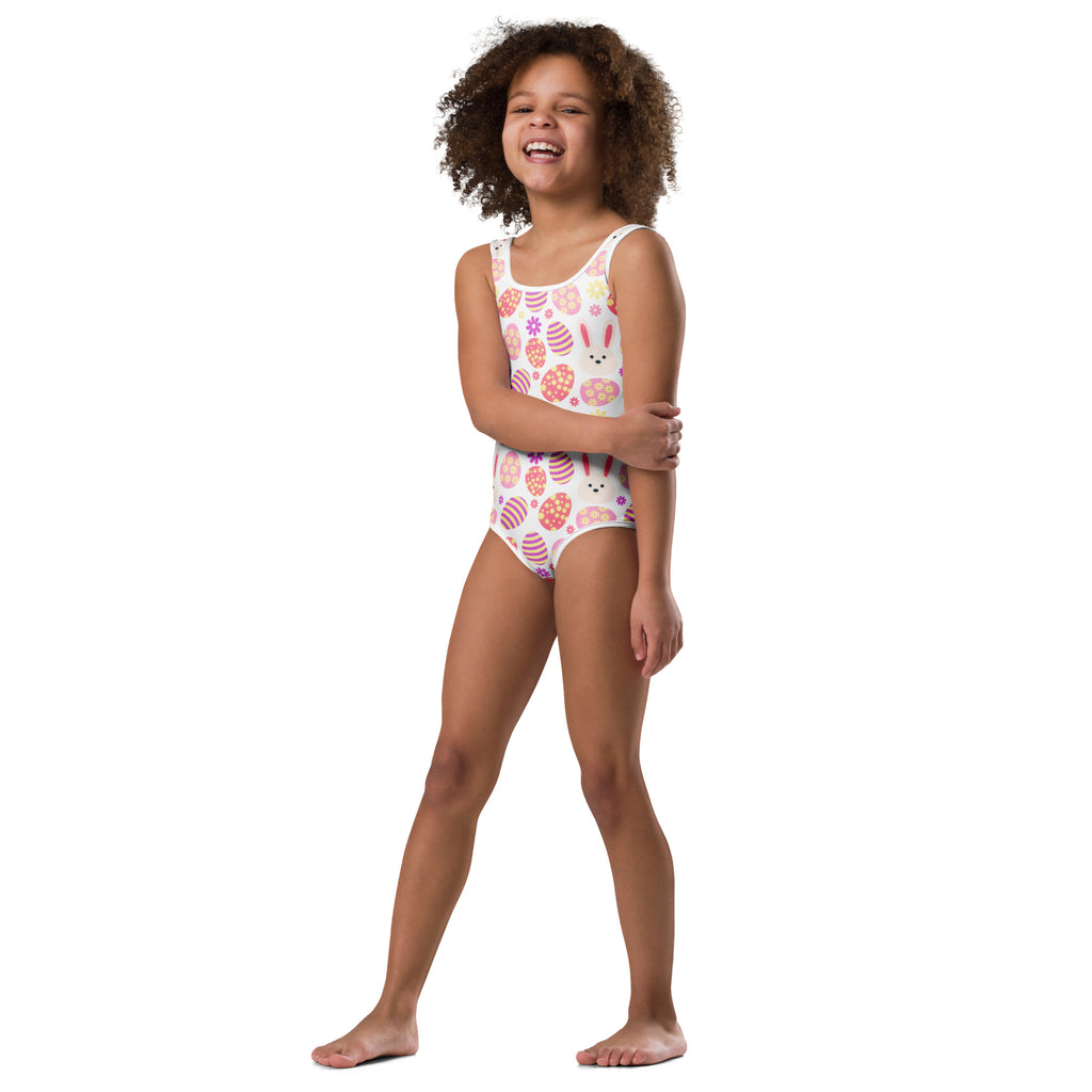 Girls pastel bunny and easter egg buttery soft white leotard with pink purple eggs and floral motifs for dance and gymnastics