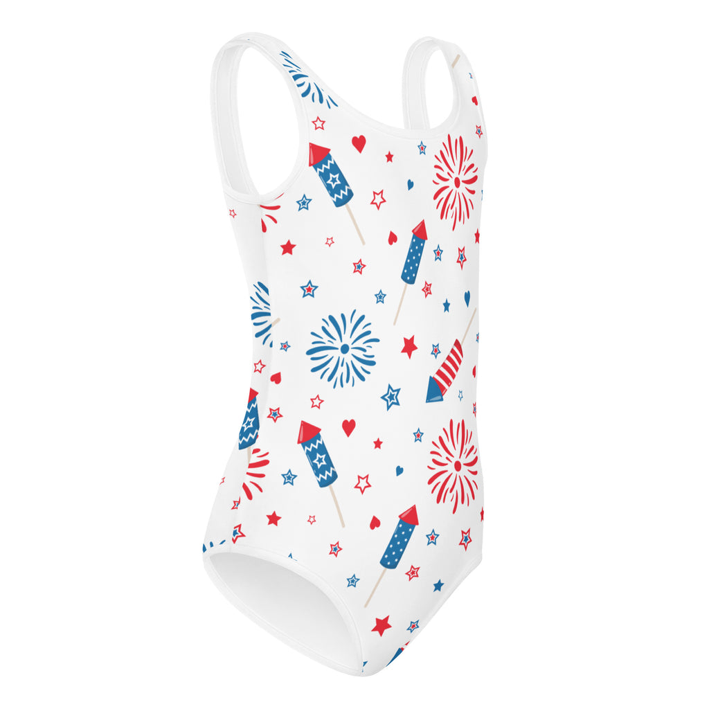 White one-piece swimsuit with red and blue fireworks stars and rockets pattern buttery soft quick drying for girls dance and gymnastics