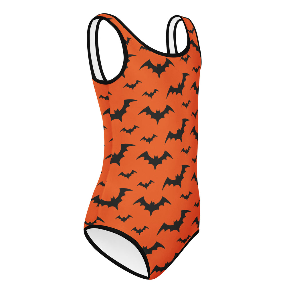 Girls orange one-piece swimsuit with black bat pattern and white trim buttery soft quick-drying for dance and gymnastics
