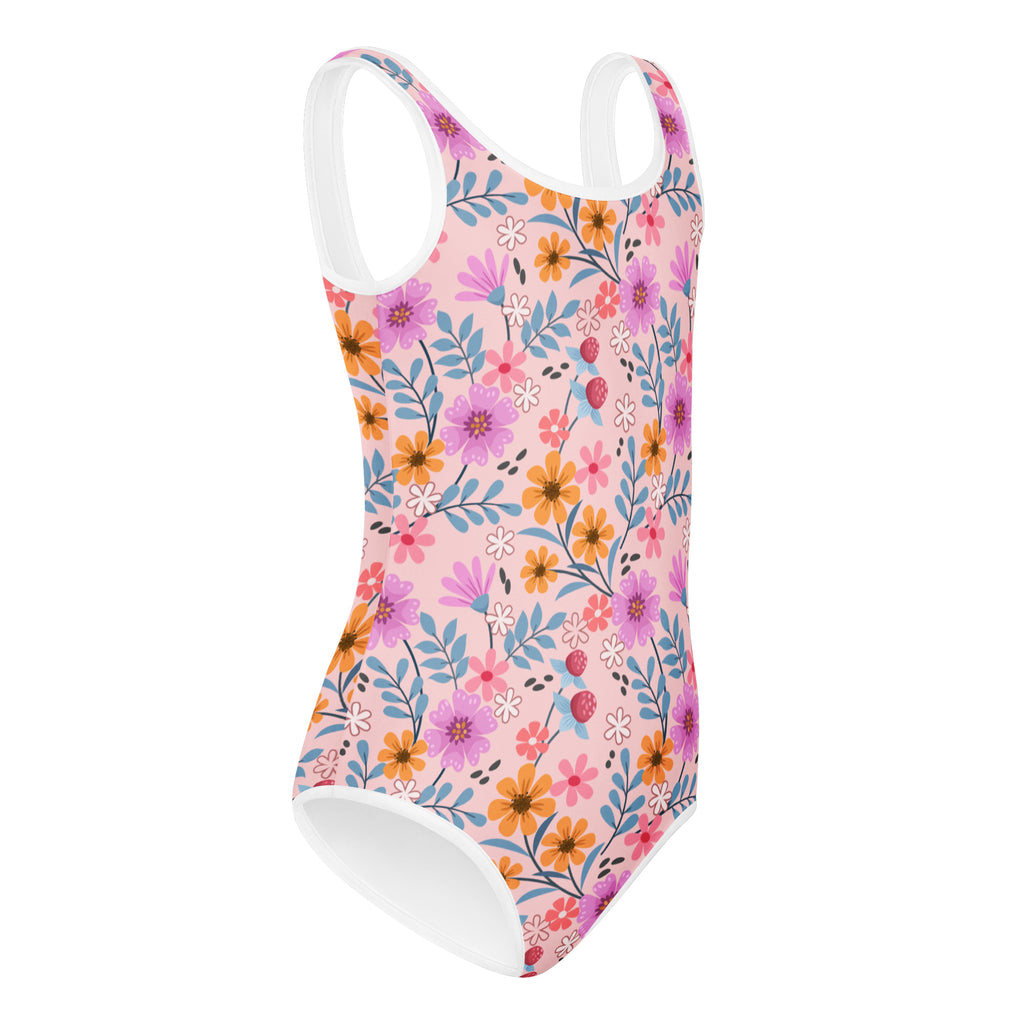 Girls pink floral buttery soft one-piece swimsuit with white trim and vibrant purple orange blue flowers for dance and gymnastics