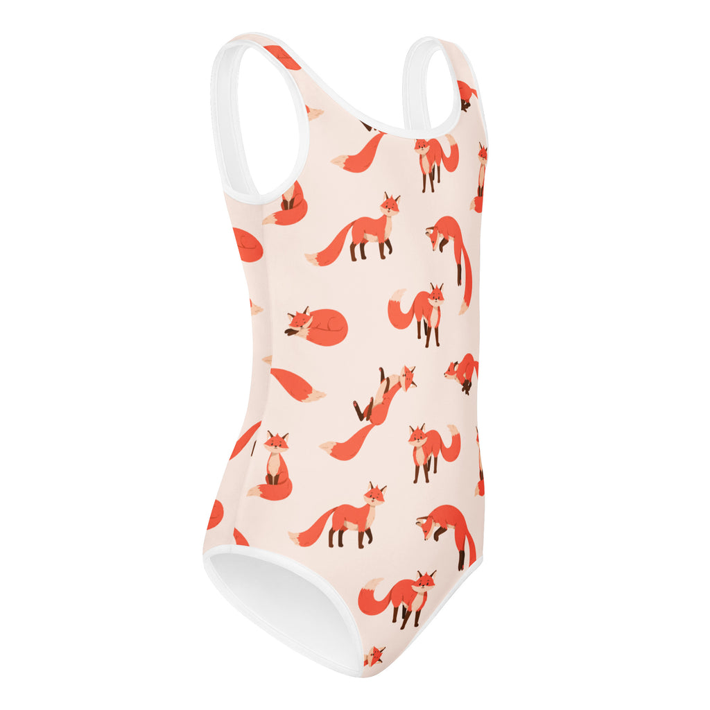 Girls fox buttery soft leotard in peach with red fox pattern and white trim quick drying for dance and gymnastics