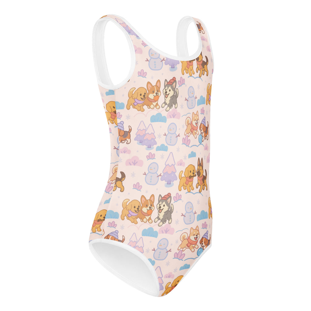 Girls winter puppy buttery soft pink one-piece swimsuit with white trim and playful cartoon dogs and snowmen pattern