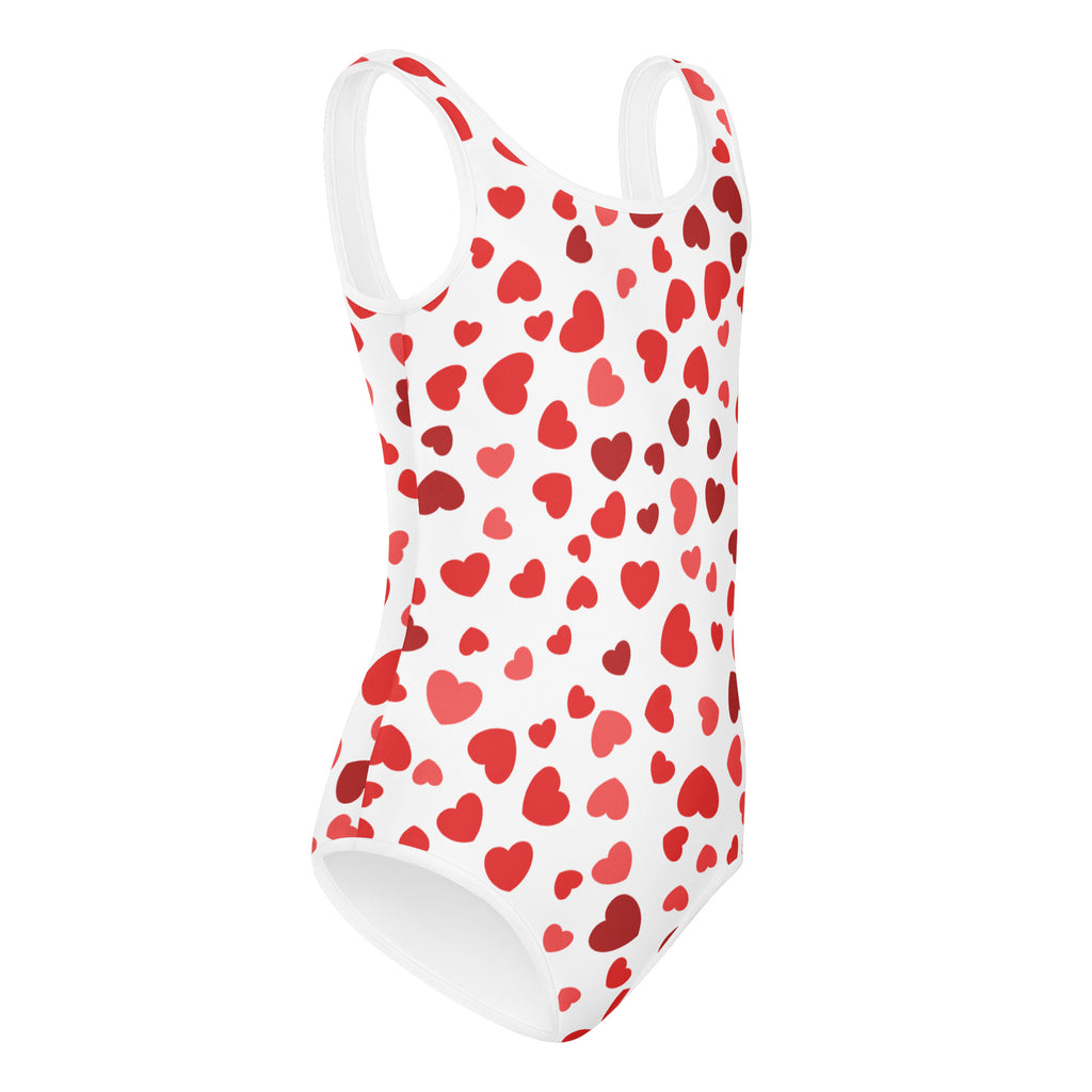 White buttery soft one-piece swimsuit with playful red heart pattern for girls valentines day dance and gymnastics