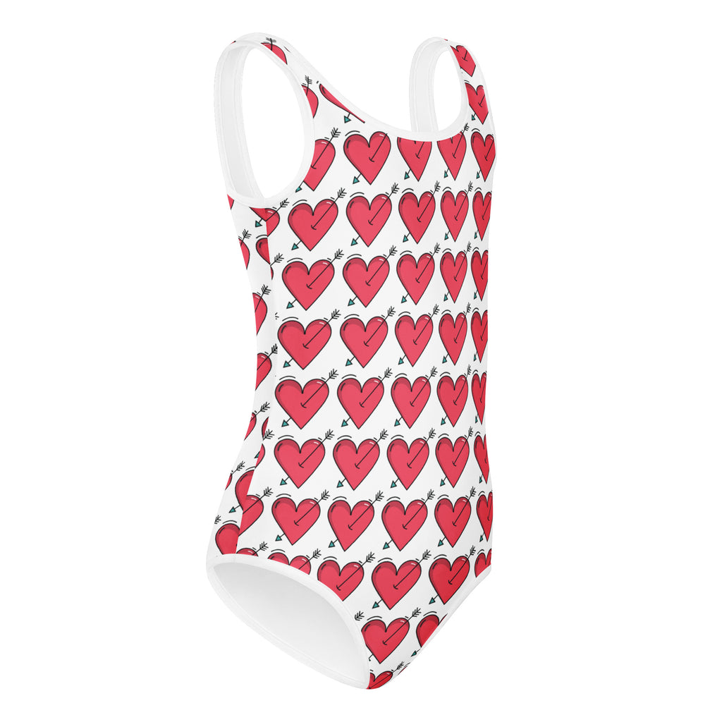 White buttery soft girls one-piece swimsuit with red cupid heart and black arrow pattern for dance and gymnastics