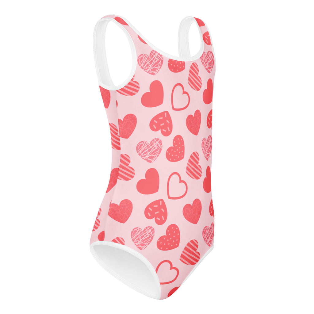 Girls pink heart pattern buttery soft leotard with white trim and playful hearts quick drying for dance and gymnastics