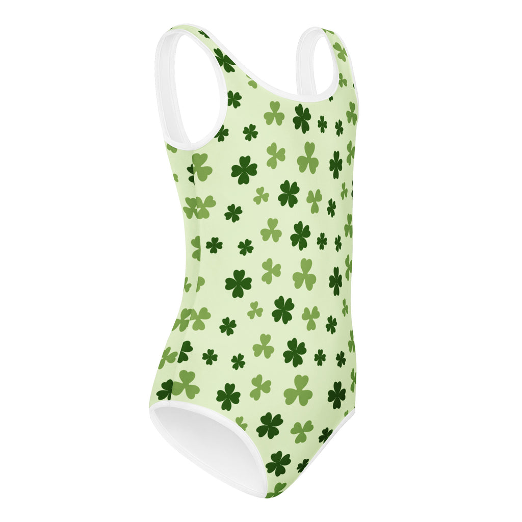 A light green girls St. Patricks Day buttery soft leotard with clover pattern and white trim for dance and gymnastics