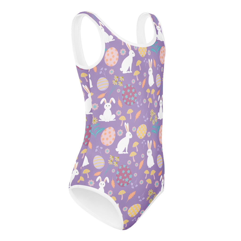 Girls purple Easter bunny buttery soft leotard with white trim and playful Easter-themed pattern for dance and gymnastics