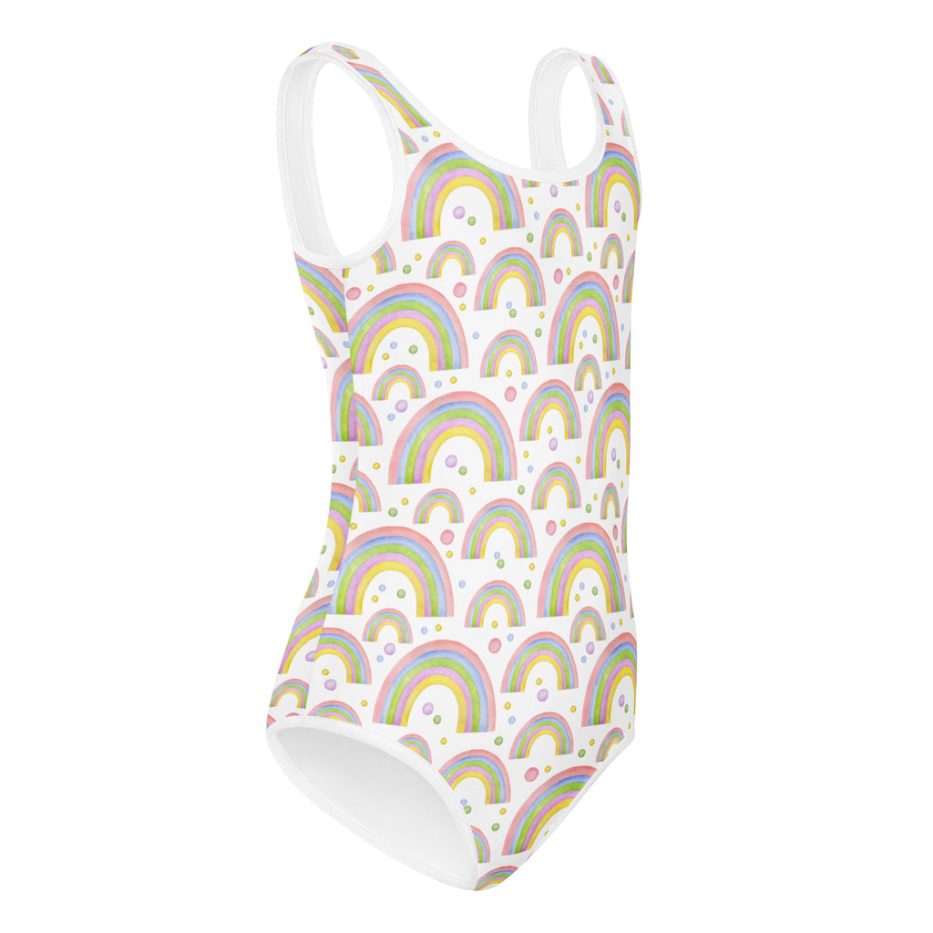White one-piece swimsuit with pastel watercolor rainbows and dots made of buttery soft quick drying fabric for girls