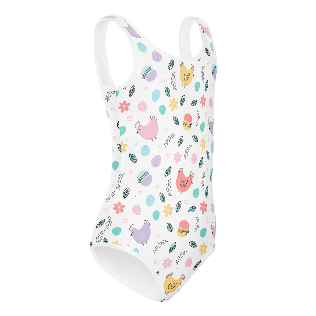 White one-piece girls easter hen leotard with pastel chick and egg pattern made of buttery soft quick drying fabric