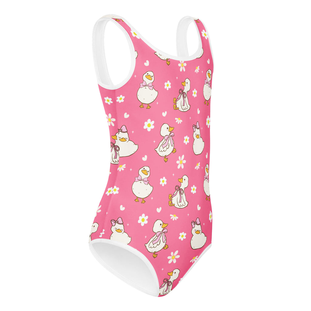Girls pink duck buttery soft leotard with white trim and playful duck pattern quick drying for dance and gymnastics