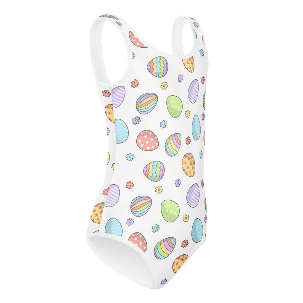 White one-piece buttery soft leotard with colorful pastel easter egg and flower pattern for dance and gymnastics