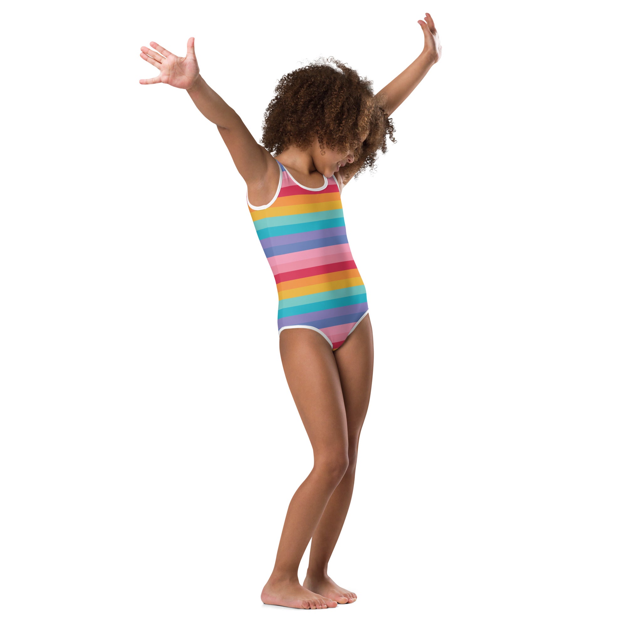 A child wearing a bright striped rainbow buttery soft leotard with white trim for dance and gymnastics