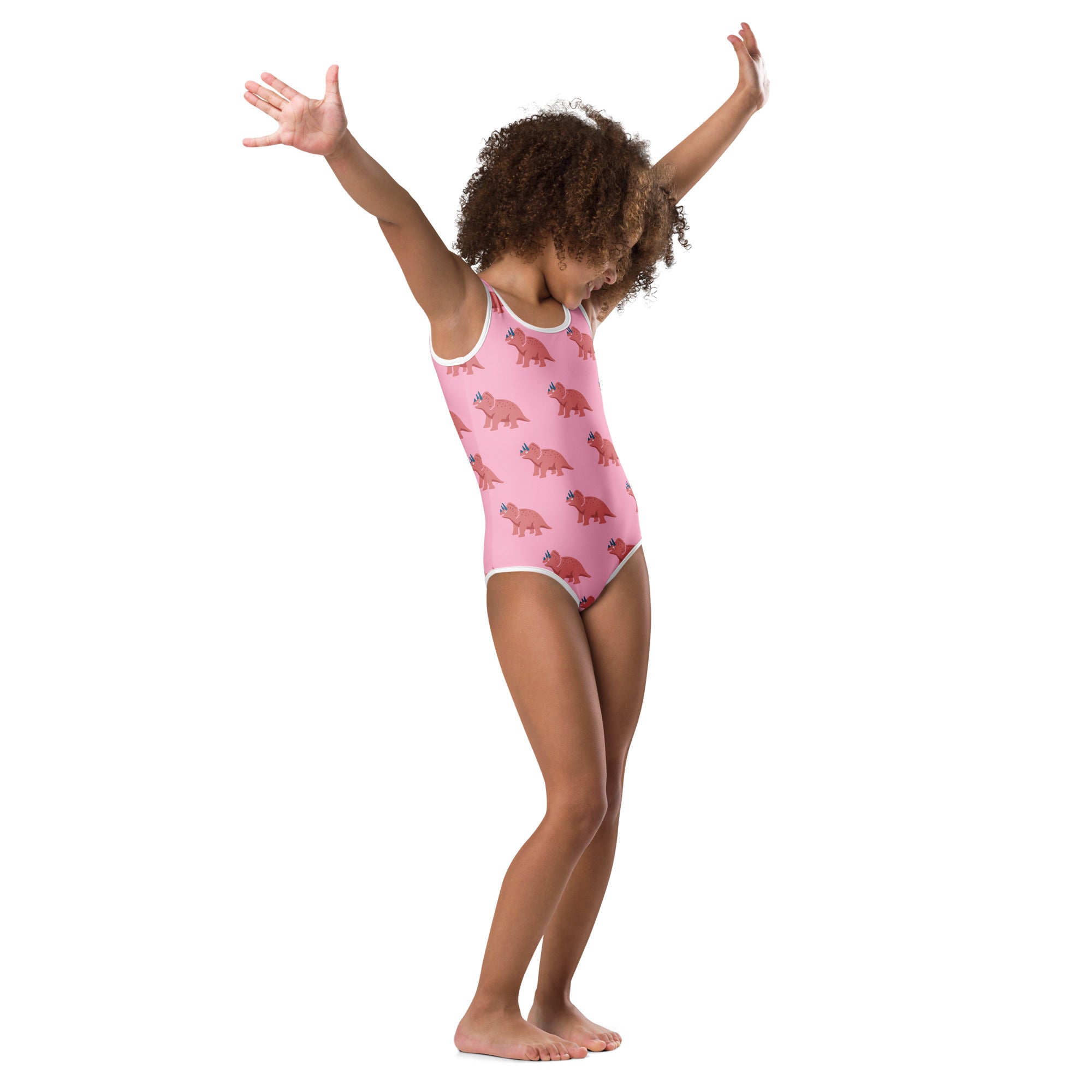 Girls pink triceratops buttery soft leotard with white trim and quick drying fabric for dance and gymnastics