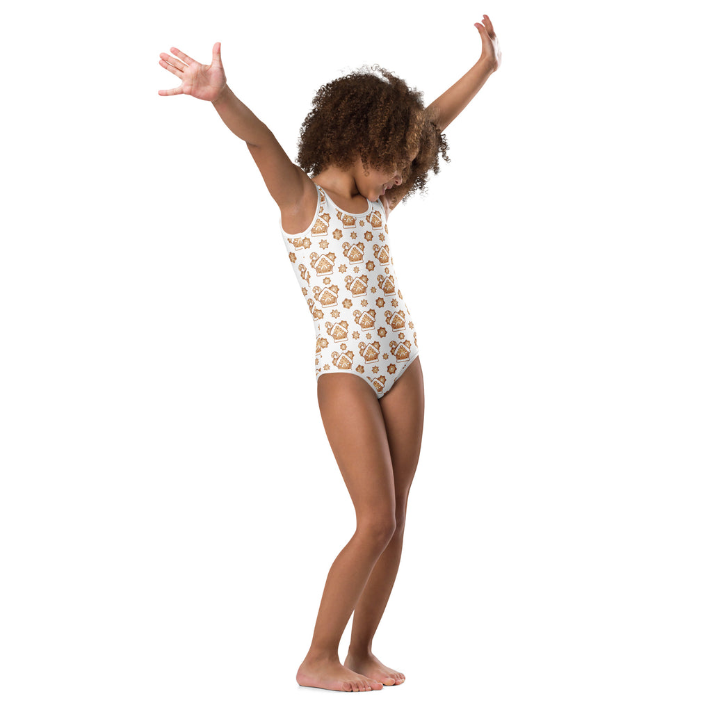 Girls white buttery soft quick drying leotard with brown and gold teddy bear and star pattern for dance and gymnastics