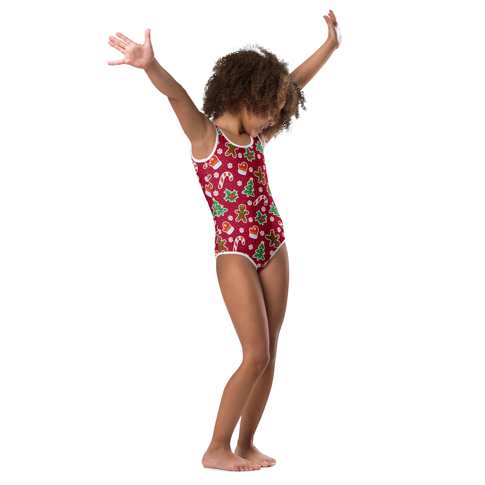 Girls red buttery soft Christmas leotard with white trim and festive gingerbread candy cane and tree patterns for dance
