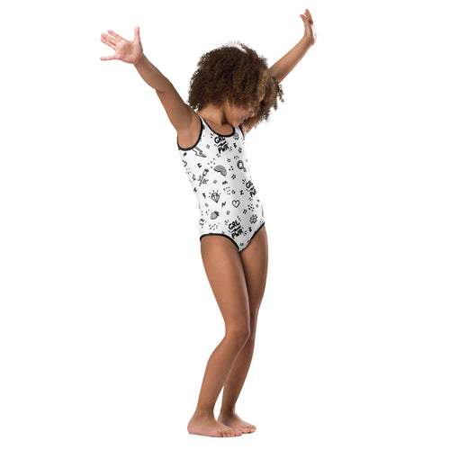White one-piece buttery soft leotard with black trim and girl power stars hearts rainbows pattern for dance and gymnastics