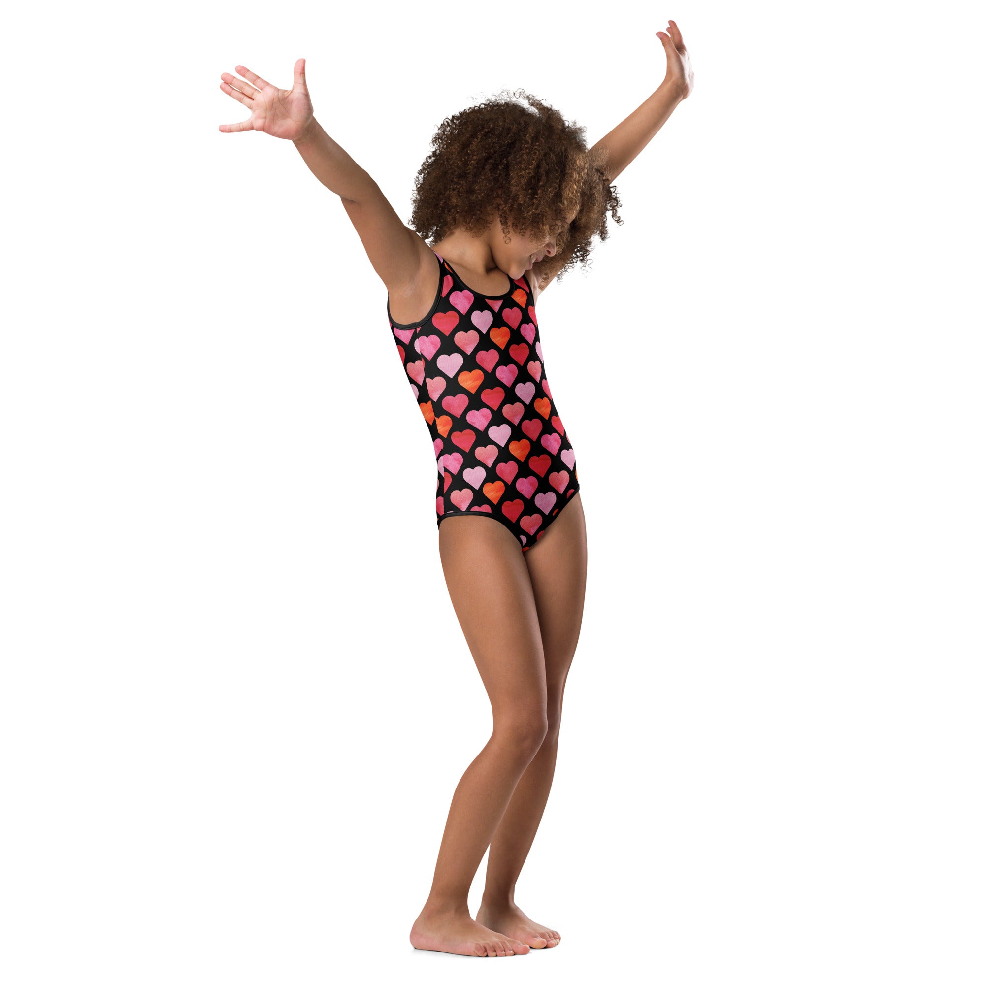 Black one-piece swimsuit with vibrant pink and orange hearts quick drying buttery soft for girls dance and gymnastics