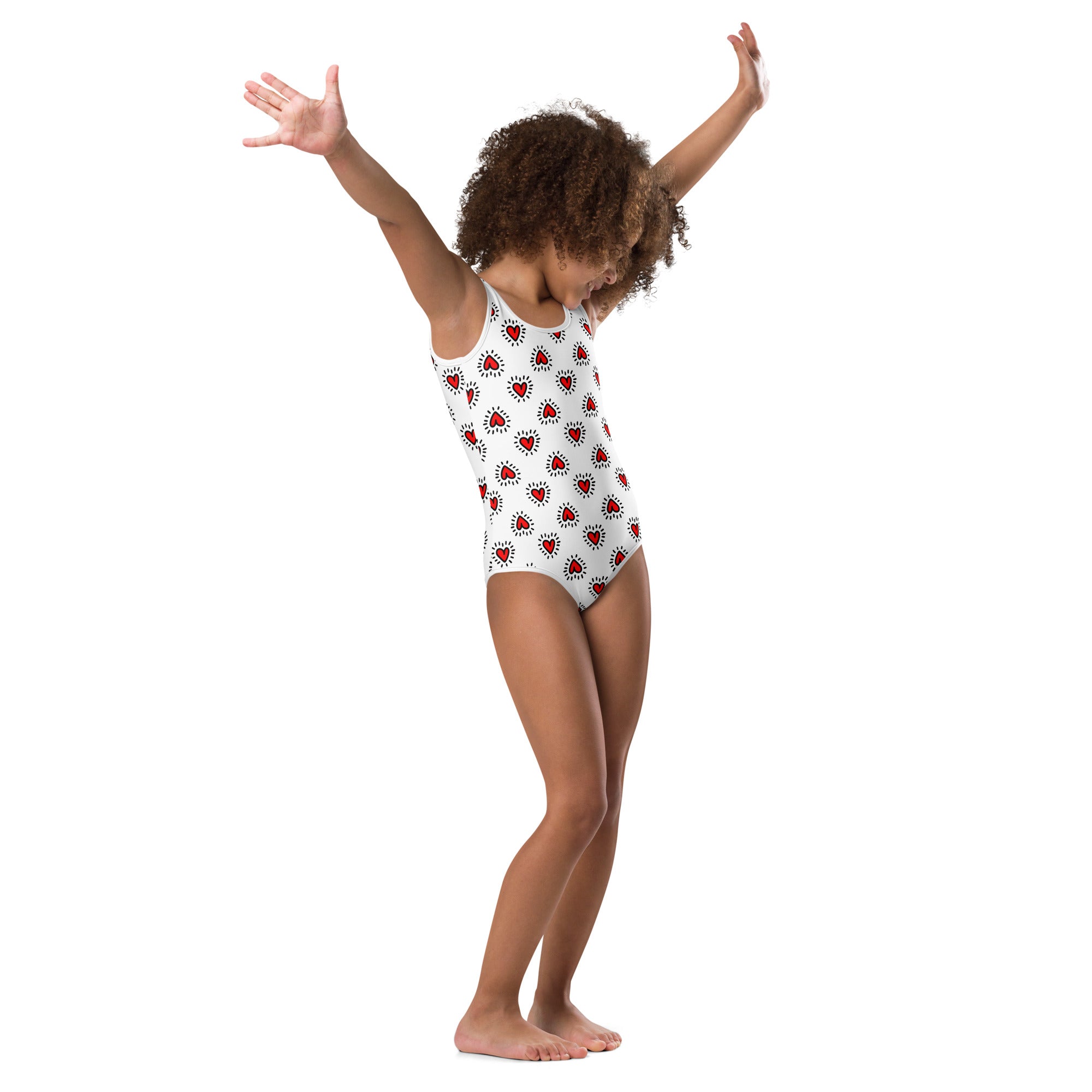 White one-piece swimsuit with red heart patterns made of buttery soft quick drying fabric for girls dance and gymnastics