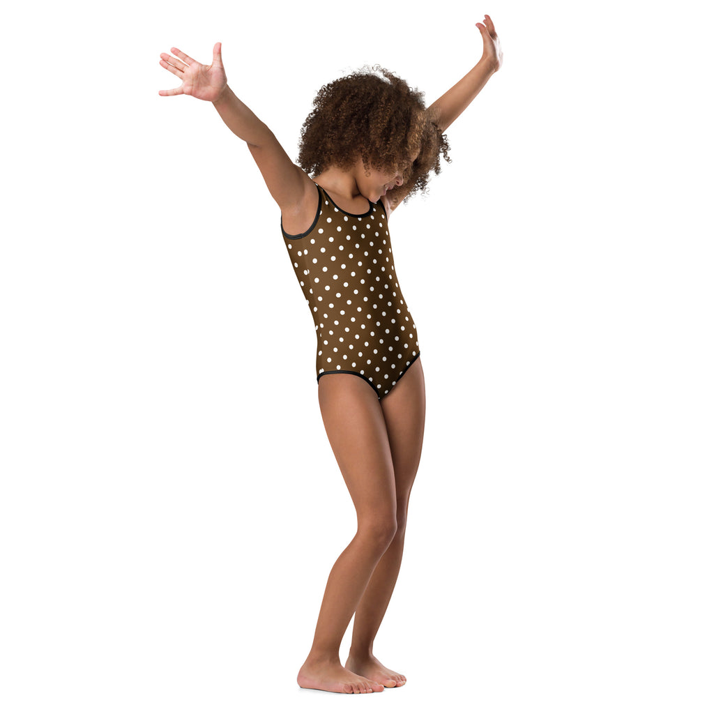 Girls brown polka dot one-piece leotard with black trim made of buttery soft quick drying fabric for dance and gymnastics