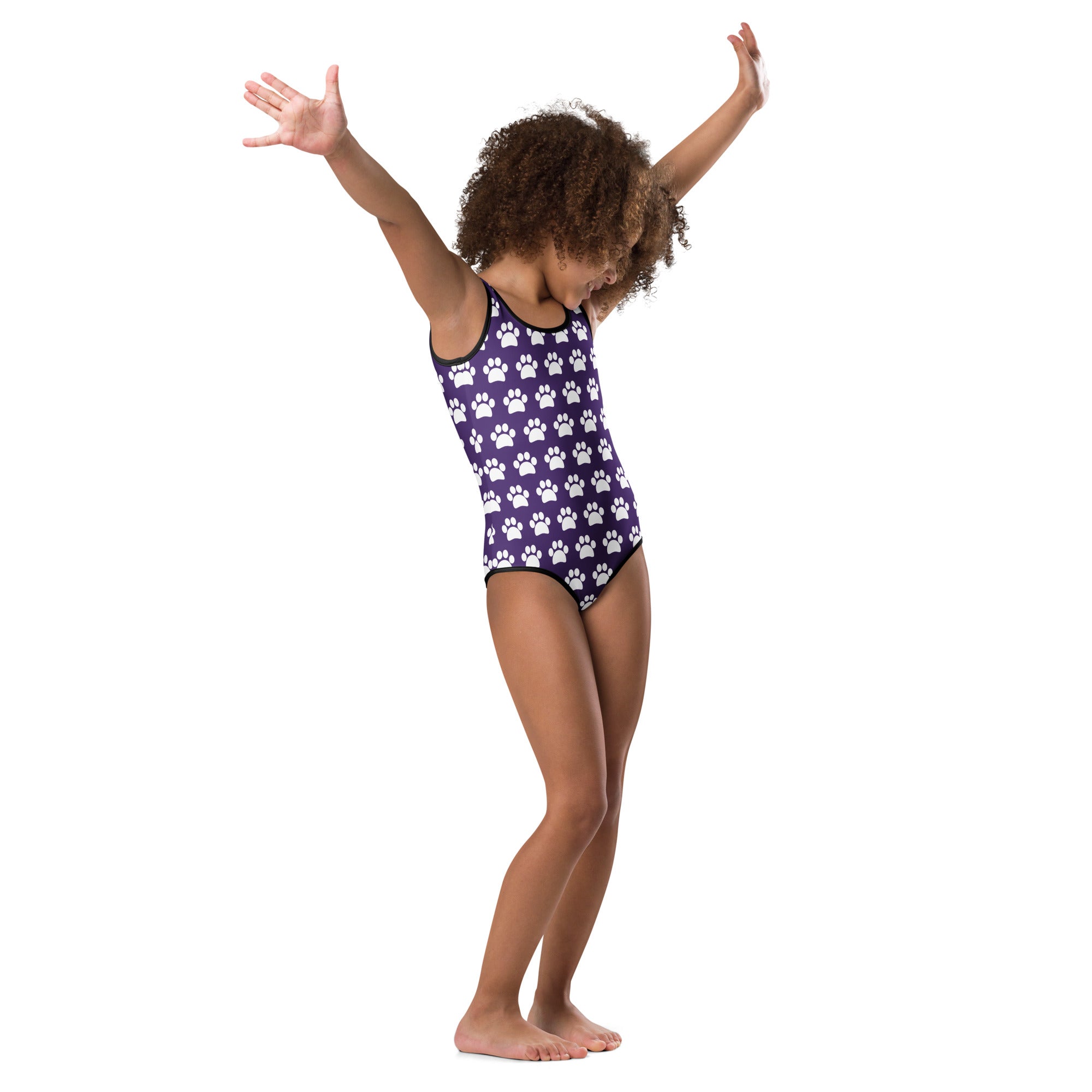 Girls purple paw print buttery soft leotard with white paw prints and black trim designed for dance and gymnastics