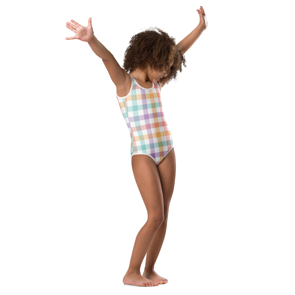 Pastel plaid one-piece swimsuit with white trim made of buttery soft fabric for quick drying in dance and gymnastics