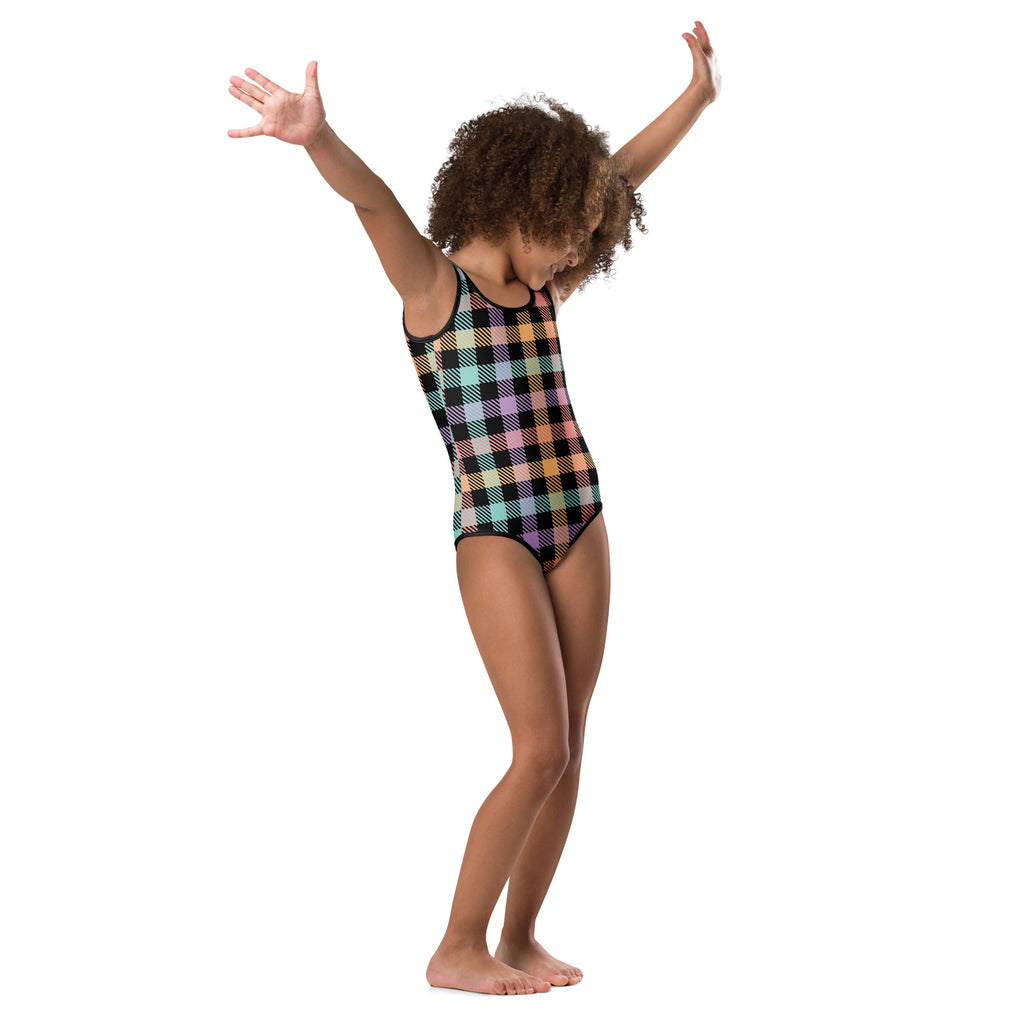 A child wearing a girls pastel gingham buttery soft quick drying leotard in colorful plaid for dance and gymnastics