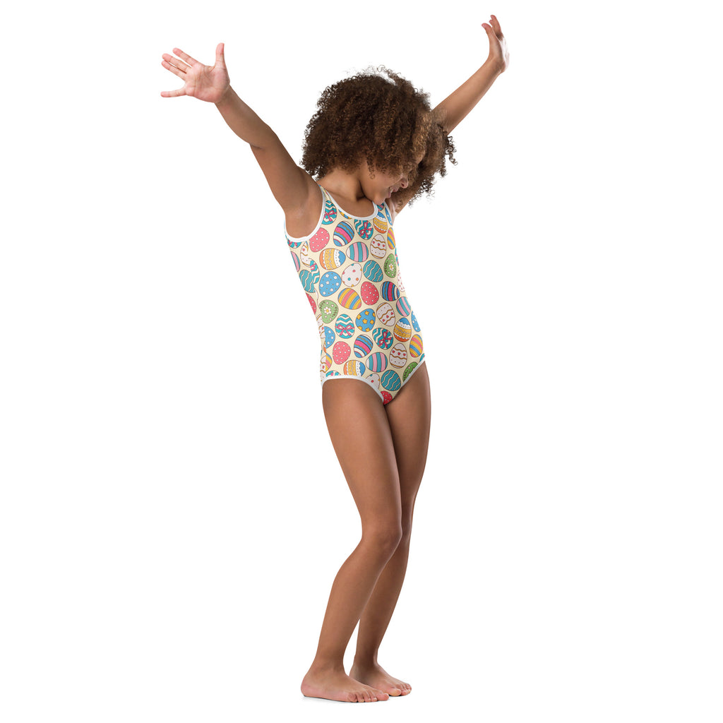 Girls bright patterned Easter egg buttery soft off-white leotard with colorful cartoon eggs for dance and gymnastics
