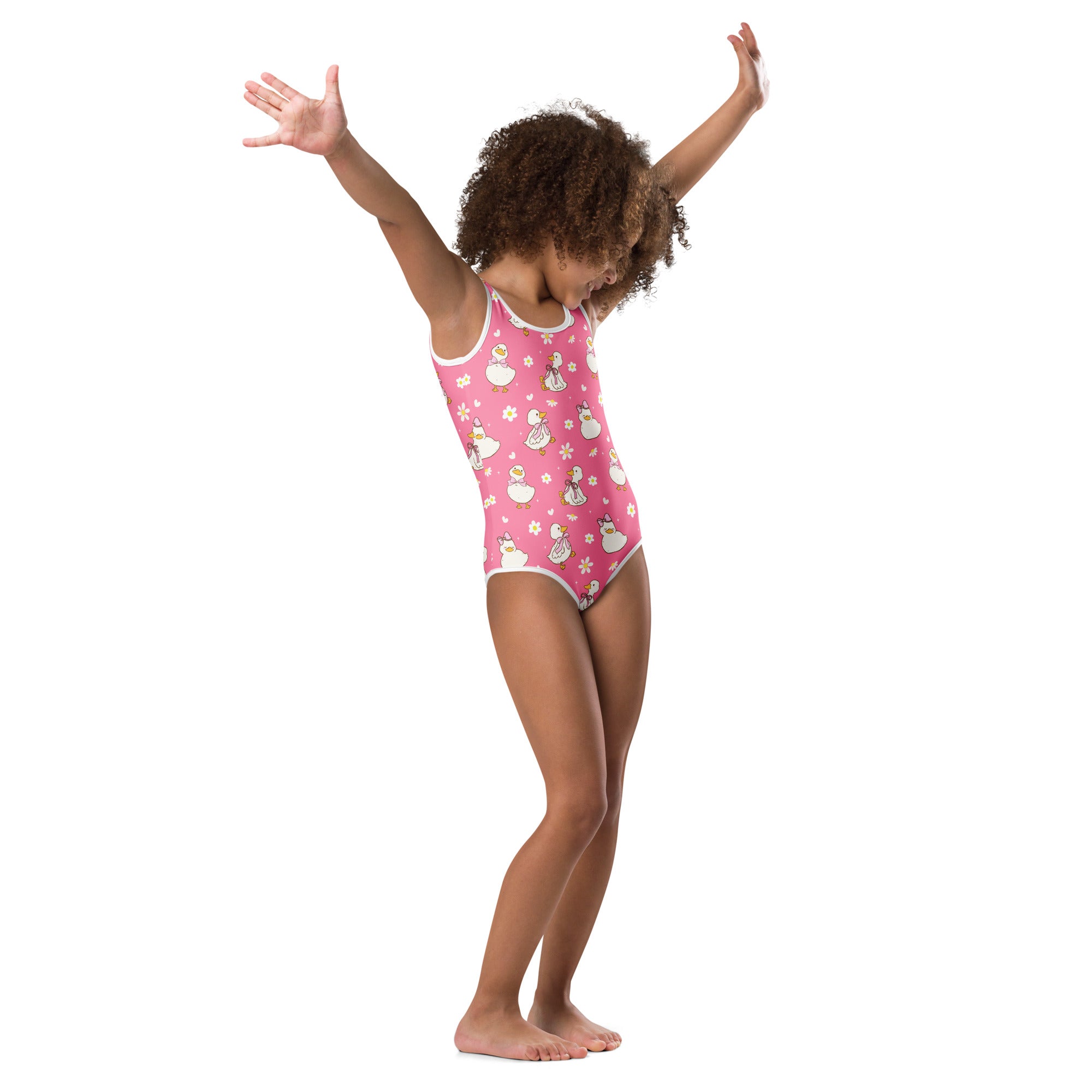 Girls pink duck buttery soft leotard with white trim and cartoon princess pattern for dance and gymnastics