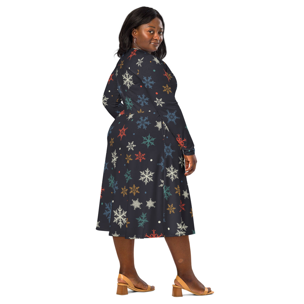 Women’s dark navy long sleeve midi dress with colorful snowflake pattern and pockets perfect for winter wear