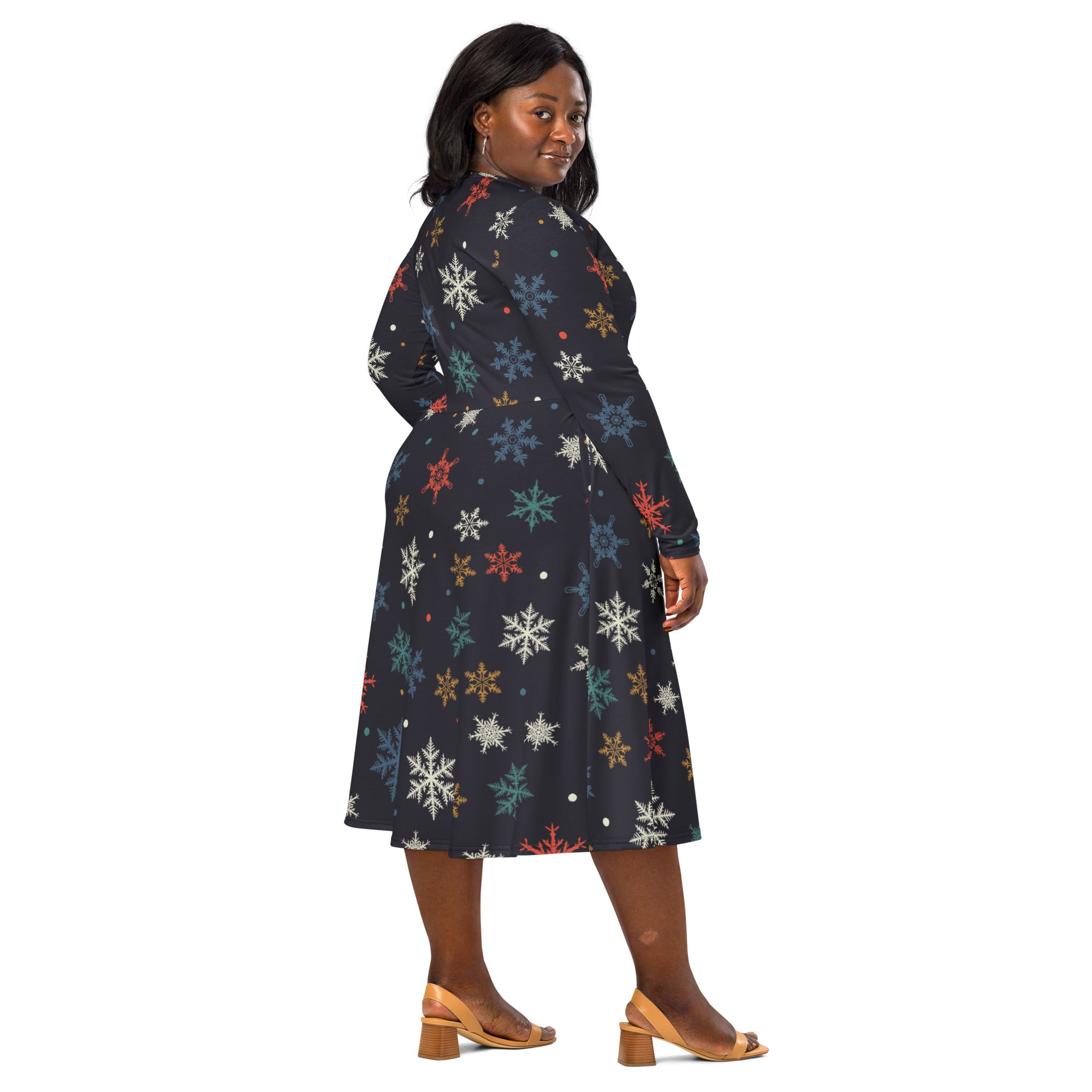 Women’s dark navy long sleeve midi dress with colorful snowflake pattern and pockets perfect for winter wear